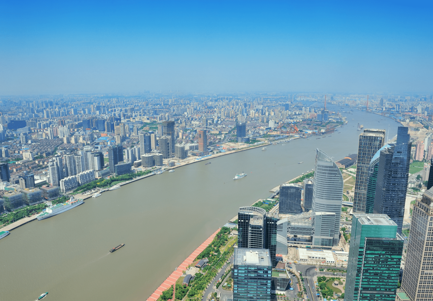 cemcoa construction and infrastructure development city skyline riverfront urban buildings