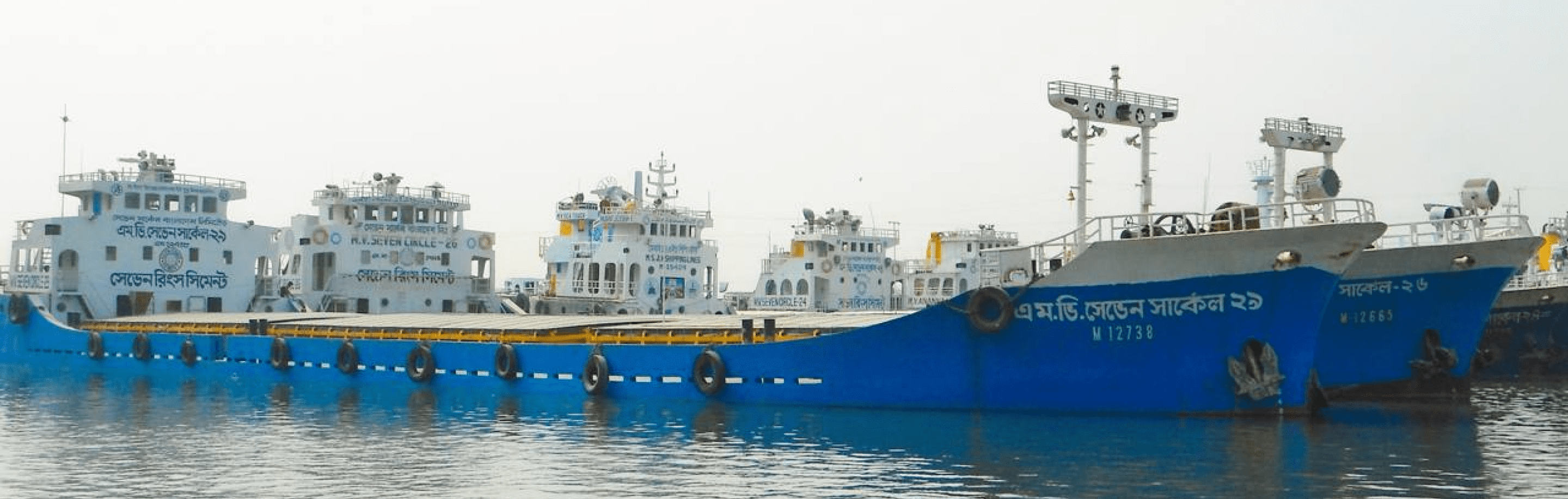 Seven Rings Cement cargo vessels docked at port for cement transportation