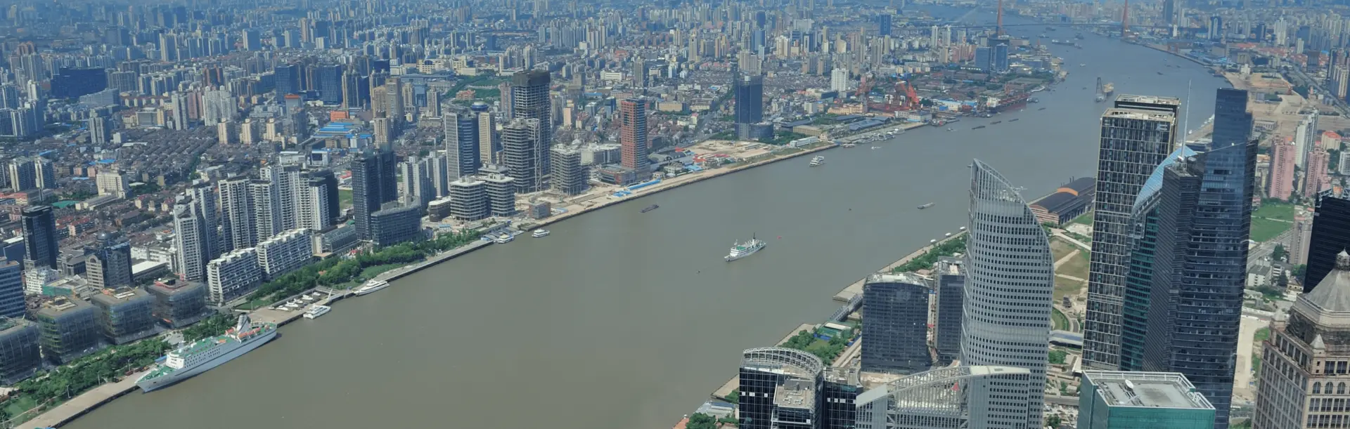 cemcoa construction and infrastructure development city skyline riverfront urban buildings