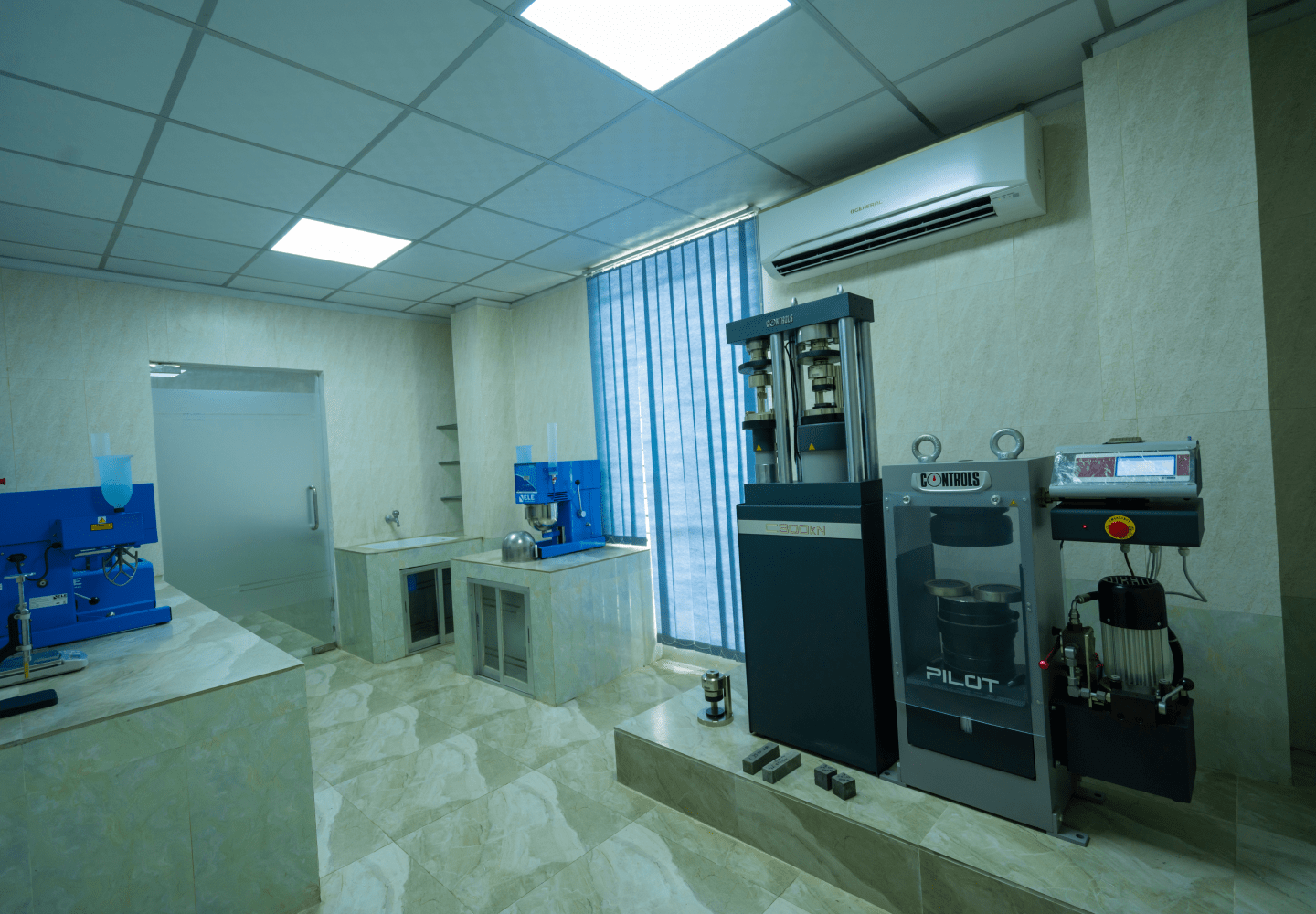 Concrete lab equipped with advanced testing machinery for optimizing mix designs and quality assurance.