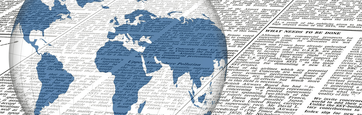 World map overlay on newspaper text for blog and news updates