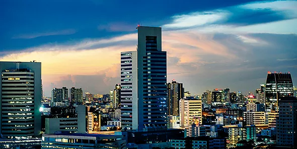 City skyline showing the diverse applications of Seven Rings Cement in construction.